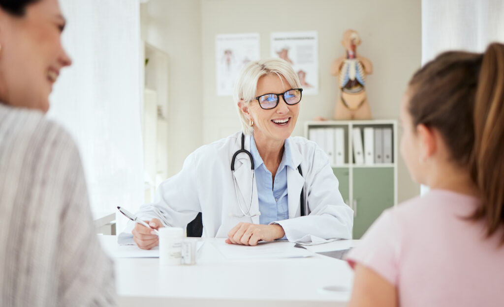 smiling doctor at thrive medical clinic in austin